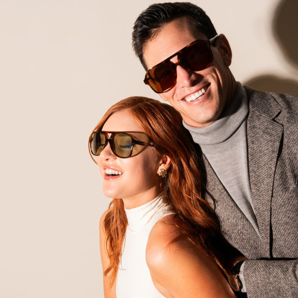 olive sunglasses with tortoise frame on couple