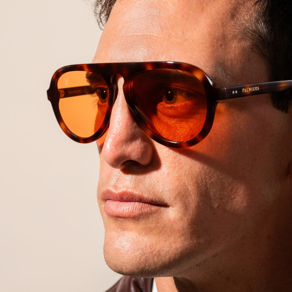 orange sunglasses with tortoise frame