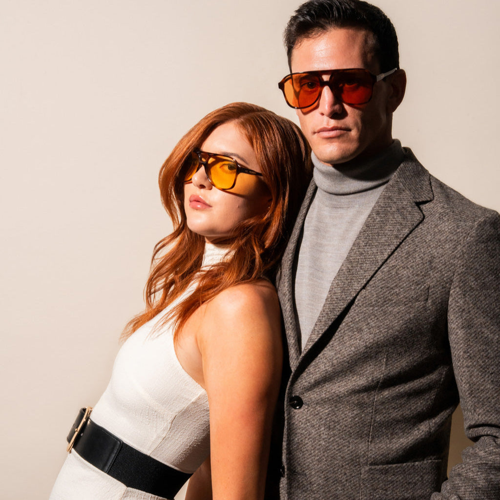 yellow sunglasses with tortoise frame on couple