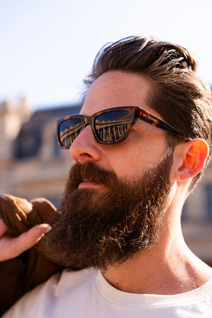Man wearing Palmiers Eyewear The Artist sunglasses in Espresso colorway.