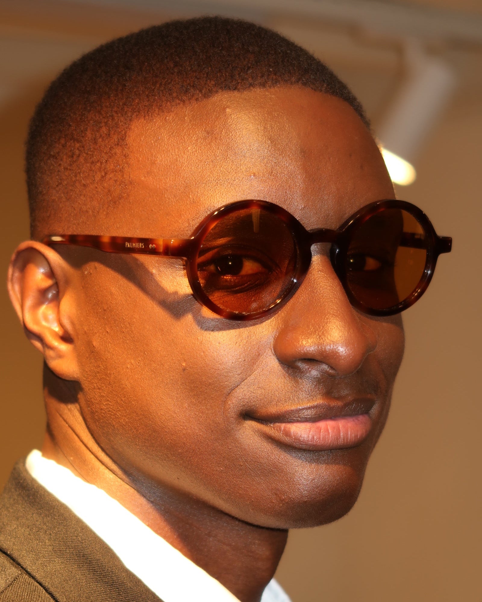 Man wearing Palmiers Eyewear The Collector sunglasses in brulee colorway.