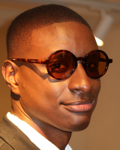 Man wearing Palmiers Eyewear The Collector sunglasses in brulee colorway.